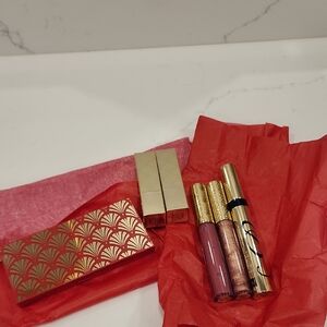 Estee Lauder Makeup Set with Gold and Red Accents